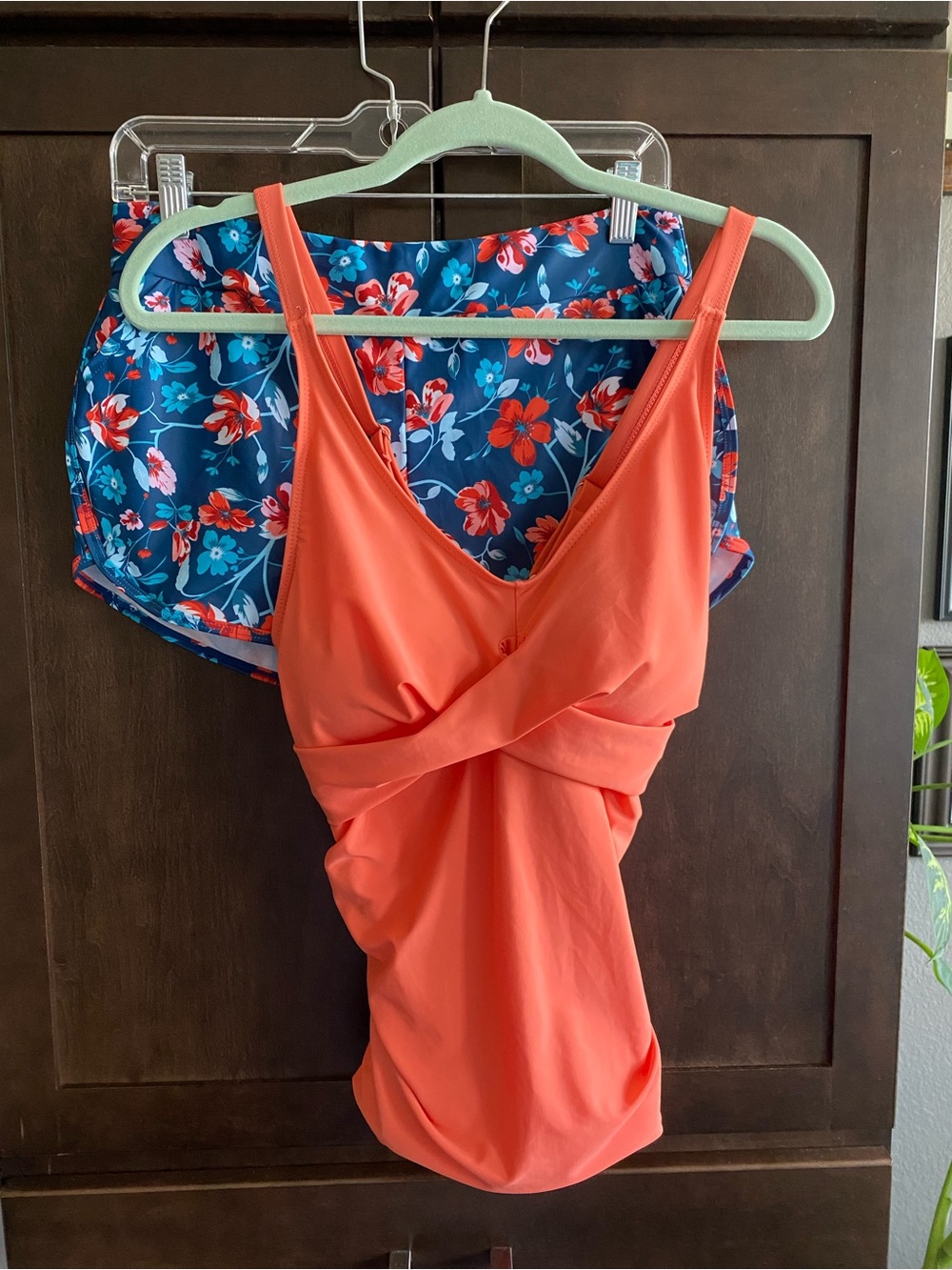 Isola Swimwear Coral Twist-Front Swim Tankini and floral boy short bottom.